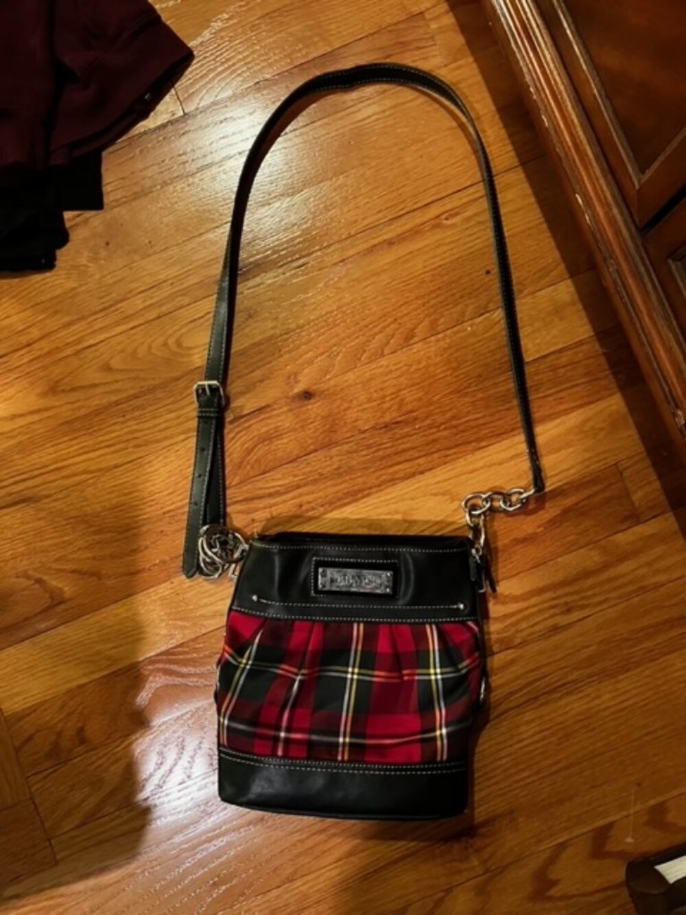 Red, black and green Chaps pocketbook